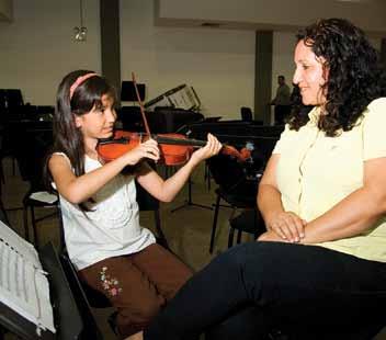 early. When I grow up I want to continue in the orchestra and travel a lot. Emilia Matheus (Emily Andreína s mother) I came from Trujillo when I was still very young.