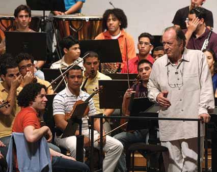 Harnoncourt and Dudamel at a master class with the SJVSB Placido Domingo during a master class-rehearsal with the Teresa Carreño Youth Orchestra Montalbán Children s Academic Center (CAIM) is one of