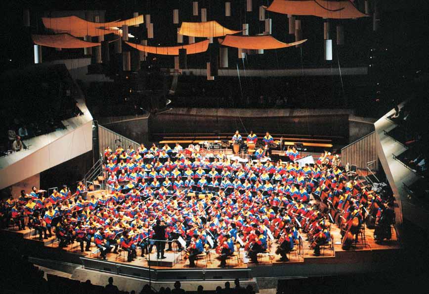 The Youth Symphony Orchestra of Venezuela at the home of the Berlin Philharmonic in 2002 in astonishment a silence so complete you could hear a pin drop- as the young conductor Gustavo Dudamel made