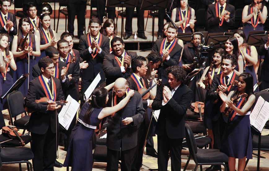 At the System s 35 th Anniversary (2010), Maestro Abreu was decorated with the orchestras insignia by the musicians of the Teresa Carreño Youth Symphonic Orchestra which I had assumed in full