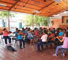 The intrinsic values of different musical aes thetics are combined in an orchestra repertoire designed to cater to the academic development of the direct beneficiaries and the enjoyment of the
