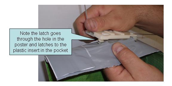 1) Insert the tip of the insert into the poster pocket: 2) Pull the