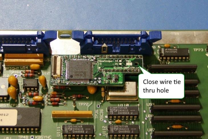 Place the NewScope-7A board on top of the strip pins and let the pins through the U3 footprint.