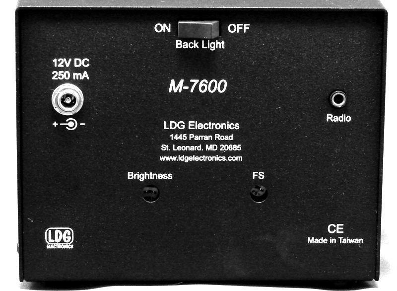 Back Panel: The rear panel of the M-7600 has two jacks, a rocker switch, and two access holes for adjustments. The DC Coax jack accepts a 2.5 x 5.