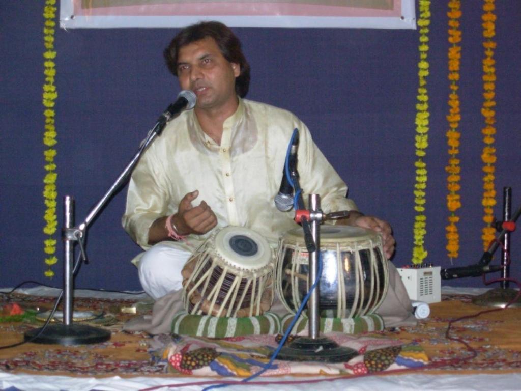 6:13 Ut.Akram Khan He is a welknown Tabla Player of Ajarada Gharana. He is emotionally attached to Baroda city. He has performed many times in Baroda.