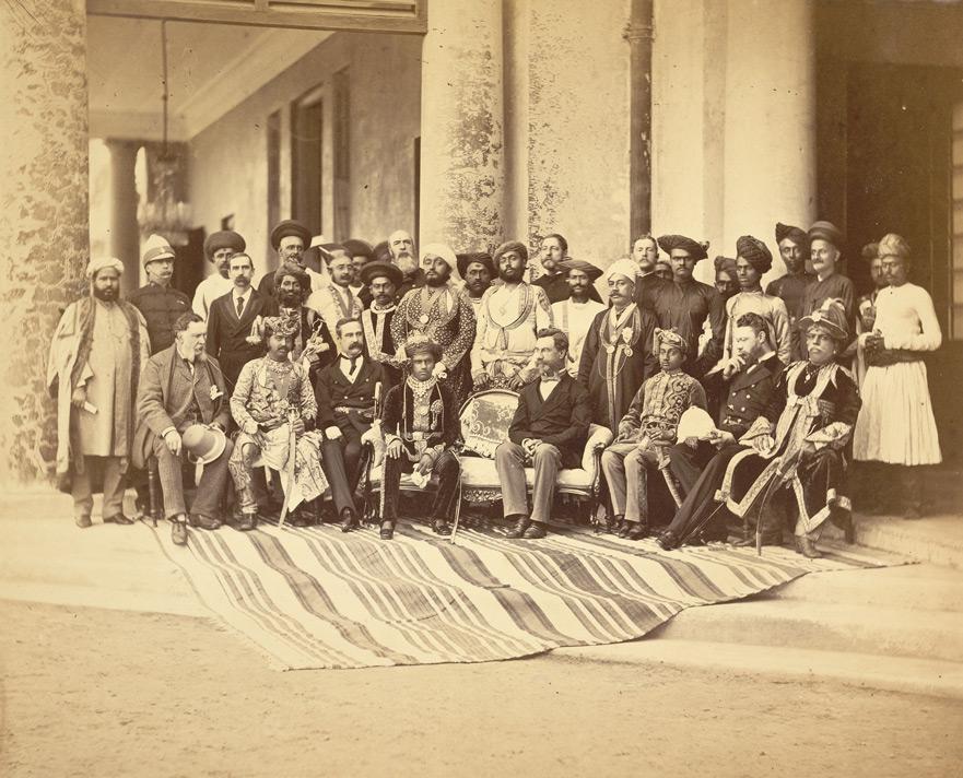 Description Group portrait of Sir Sayaji Rao, the young Gaekwar of Baroda (seated, front centre), Sir Richard Temple, Governor of Bombay and officials.