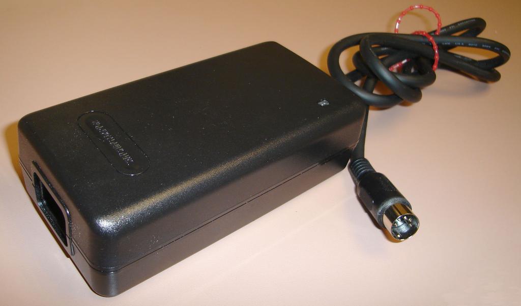 INSTAATION AND POWE Power Supply The AI console is powered by a factory supplied power adapter with 00-0V/0-0Hz input, 0W maximum output power, and a foot long output cable.
