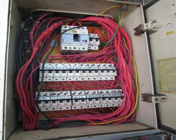 FINDING NO: E- 26 Cables inside distribution board is disorganized.