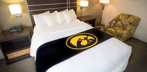 IOWA HOUSE HOTEL Stay on campus at the Iowa House Hotel! Guests enjoy free: Covered Parking Continental Breakfast Wireless Internet Access to Campus Recreation & Wellness Center www.iowahousehotel.