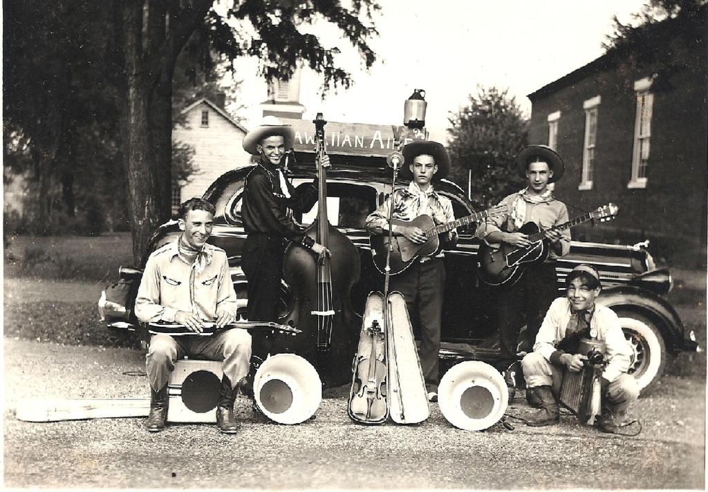Greenfield Picnics Hawaiian Aires performed at Greenfield on August 9, 1941. Left to Right: Bruce Lindsey (seated), Paul Burket, Junior Cox, Clarence Lindsey and Smokey Pleacher (kneeling).