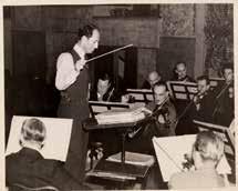GEORGE'S CAREER George Gershwin rehearsing with the Los Angeles Philharmonic, 1937. George Gershwin was at the height of his career in 1937.