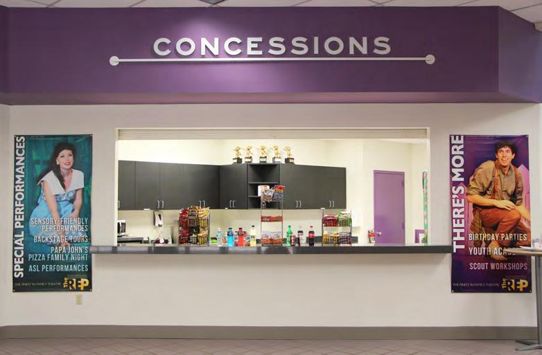 concession stand There is a concession stand in the lobby where I can go to buy snacks, drinks, and