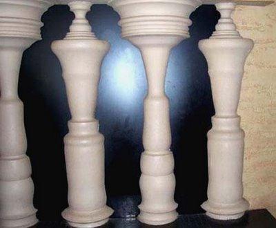 chess pieces or the black human figures in