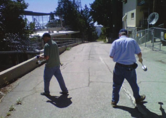 Dave Pinion, PE, of Hatfield & Dawson Consulting Engineers and the author, Richard Strickland, make measurements on the road at the Mt. Wilson antenna farm in August 2011. 3.2 percent or 8.6 percent?