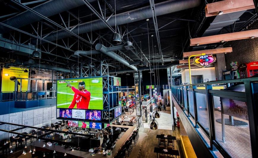 Edmonton game-lovers can play over 100 amusement games Multiple bars throughout the space serving six draught