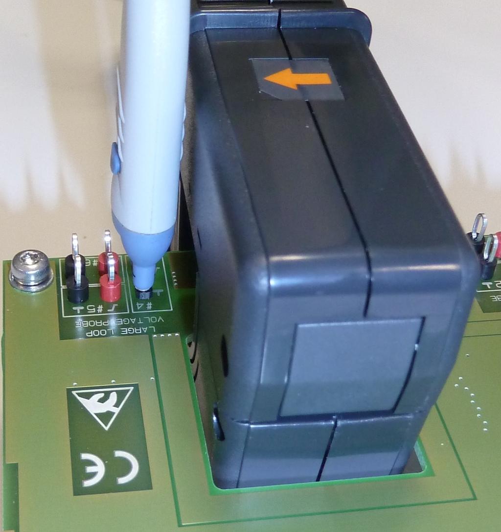 g. R&S RT-ZP10: a) Clamp the signal hook/positive hook to the red pulse clamp-on connector.