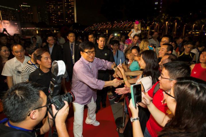 Jackie Chan greeted excited fans at red carpet event outside ArtScience Museum The red