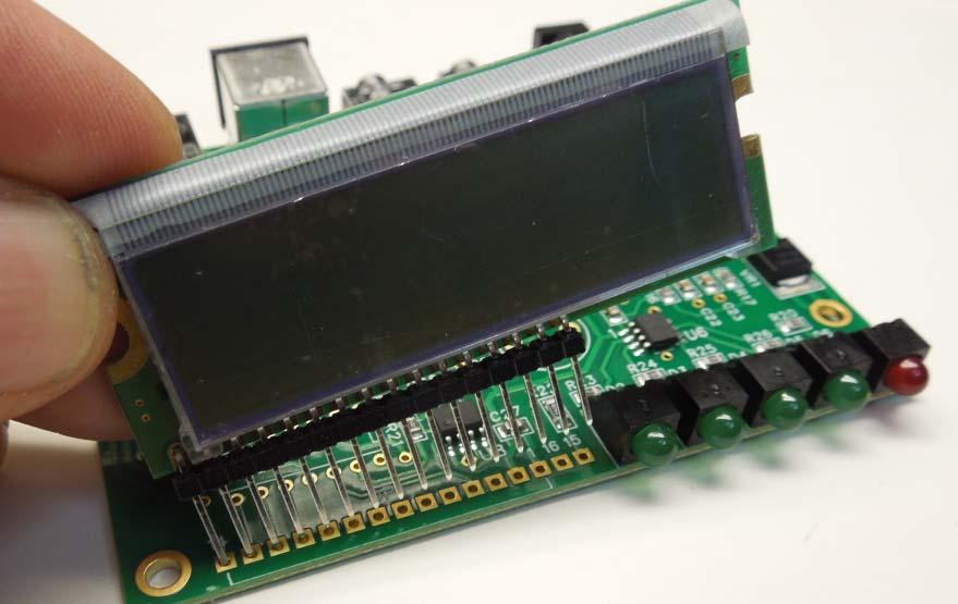 Now fit the LCD/Header sub-assembly into the K44 PC board as shown in figure 10.