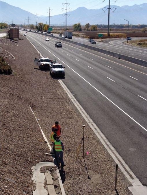 More than 7.5 miles on the south end of the I-15 CORE project, UDOT will add one southbound and one northbound lane. Dave Norman back-sights a control point to set up his robotic total station.