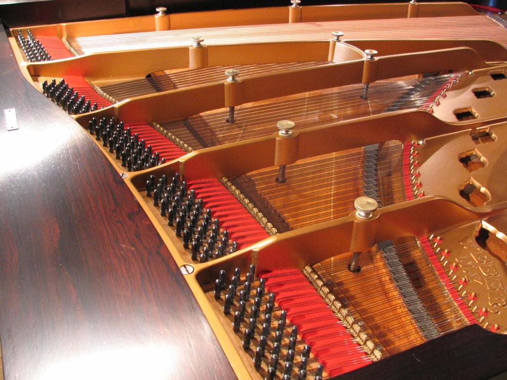 A 125 year-old grand having undergone extensive work is ready to be put back into service. "In business to bring your piano to its full potential.