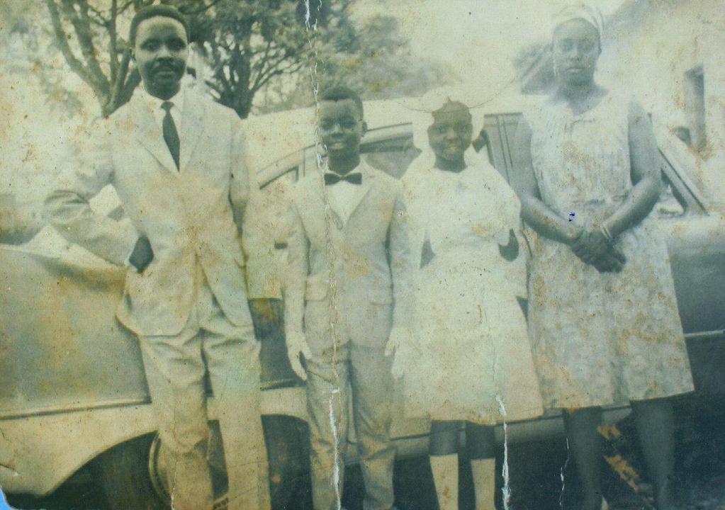 Photo 32: Bosco, Stéphane, Cathy and Stéphanie at Holy Communion 67 Stéphane Mattaly Mwenda, born in 1957, was Bosco's first son.
