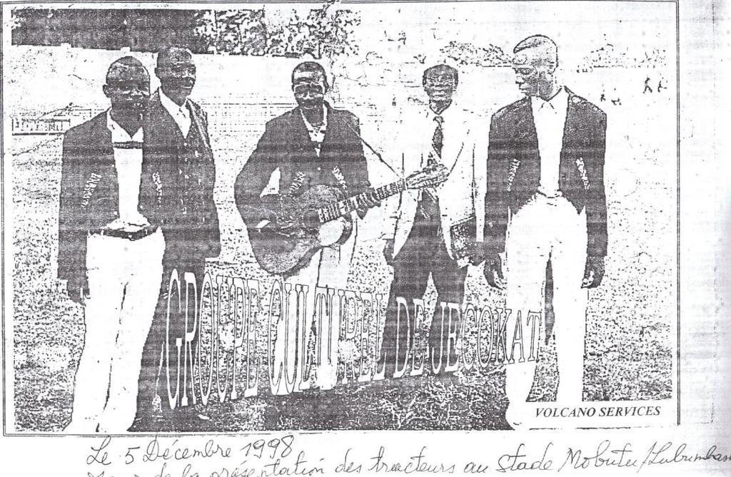 Photo 79: JECOKE in December, 1998, at Mobutu Stadium 135 Photo 80: Masengo in golden robe, with JECOKE