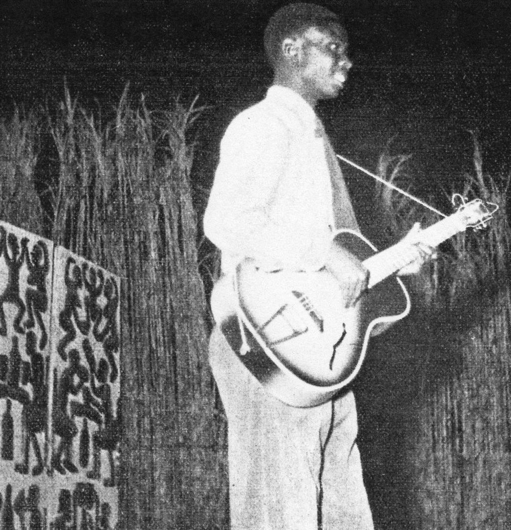 Figures 18: Bosco performing at Union Minière du Haut Katanga, now Gécamines 147 A photo of young Bosco with his guitar, intitled: "Bwana Jean Bosco, mutungaji wa nyimbo za "guitare" pa
