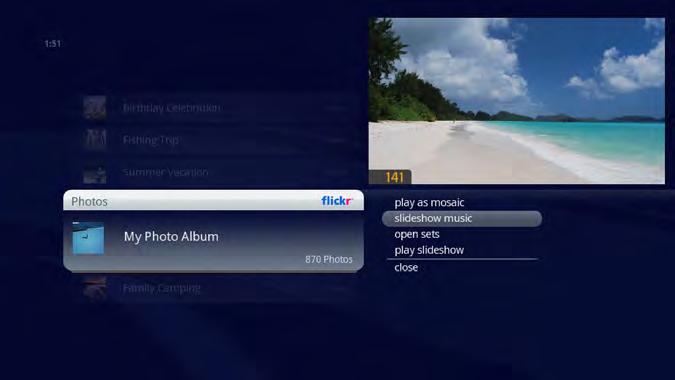 You can turn this music off by pressing INFO, choosing slideshow music, and selecting no music.