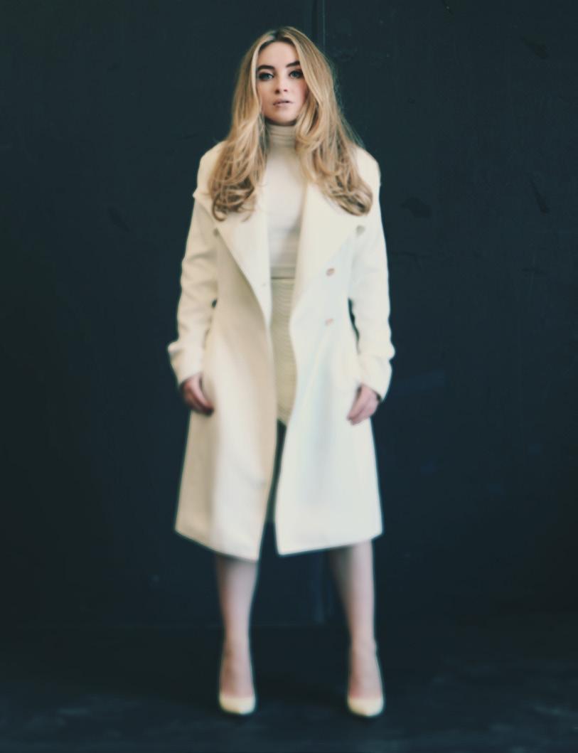 White Trench Coat: House of CB White Skirt: stylestalker Turtleneck: Theory Pumps: Jimmy Choo Carpenter says that the album focuses on the universal subjects of real-life people interactions and