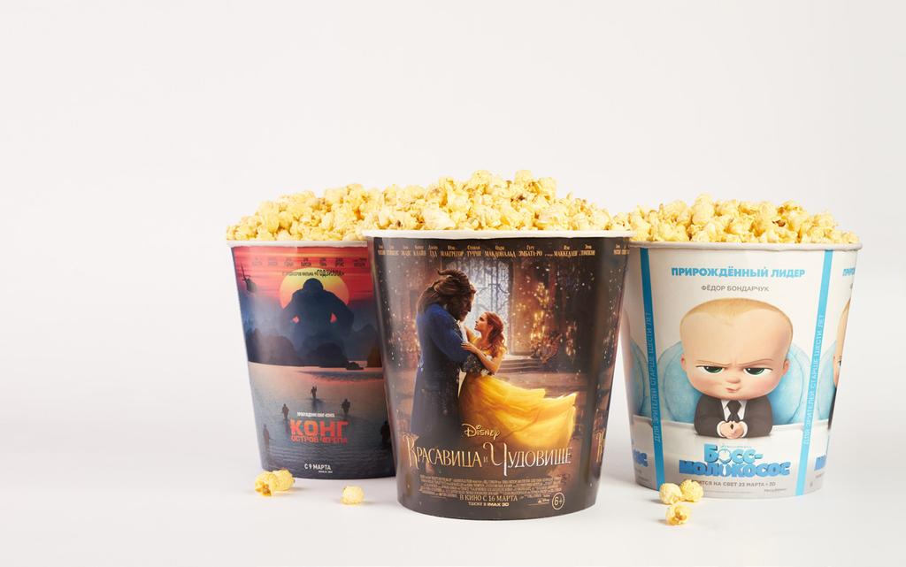 Advertisement of popcorn cups: Popcorn is the most purchased product in the cinema (each 1,5