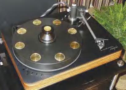 It s seen here with the new Aquilar 10in tonearm, a derivative of the 12in Axiom model, both from Germany s Acoustical Systems. www.feickert.de; www.arche-headshell.