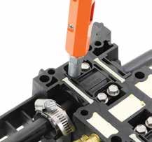 Ensure that the cable clamp and grommet flanges are properly aligned. 19.