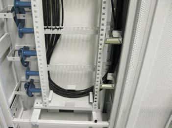 If the pigtail cables are routed from the frame downwards under the floor, they are looped behind the frame in such a away that the cables are first brought upwards and then downwards on the right