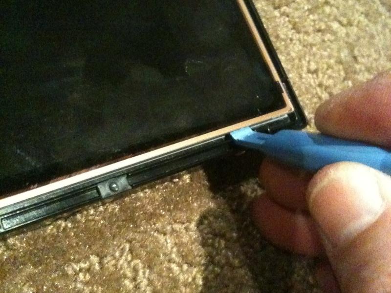 Step 15 Using a plastic spudger or pry tool, work GENTLY around the edges of the LCD to loosen it