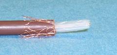 sheath. See photo. Push back the inner braid over the outer brown sheath of the cable, as shown. 2.