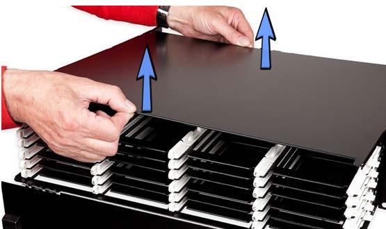 There is no need to unlock the tray when pushing it back inside the panel. 4. The cover of the panel is not screwed to the chassis.