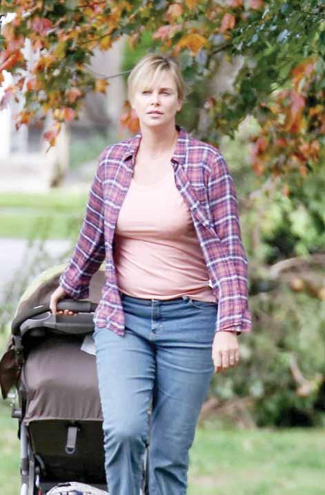 HOLLYWOOD Sunday, May 13, 2018 GULF TIMES 15 MOTHER S DAY SPECIAL Top 10 movie moms from Sandra Bullock to Sally Field By Clint O Connor In the new movie Tully, Charlize Theron exposes us to the dark