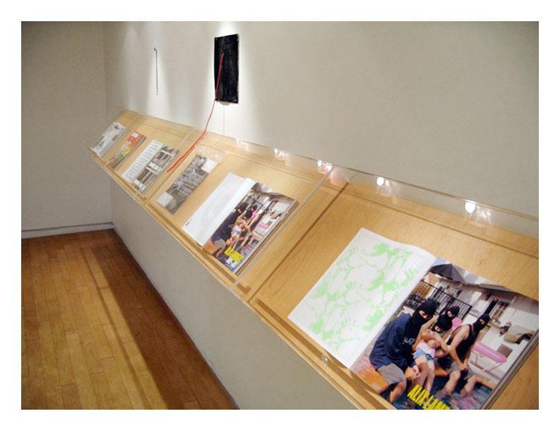 page, blank advertisement in the 2006 summer issue of Artforum. They invited seven well-known artists to intervene on the blank ad. The seven original works constitute a deluxe edition.
