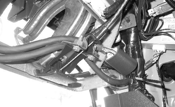 From vehicle's N-Bus prewired connector start by routing above the rear section of the hood release lever mechanism and into the C-channel to the right of the hood