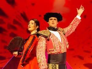 Romantic Opera Carmen by Bizet An Overture is a piece of music played at the beginning of an Opera or Musical. It has snippets of all the 'good tunes' in it.