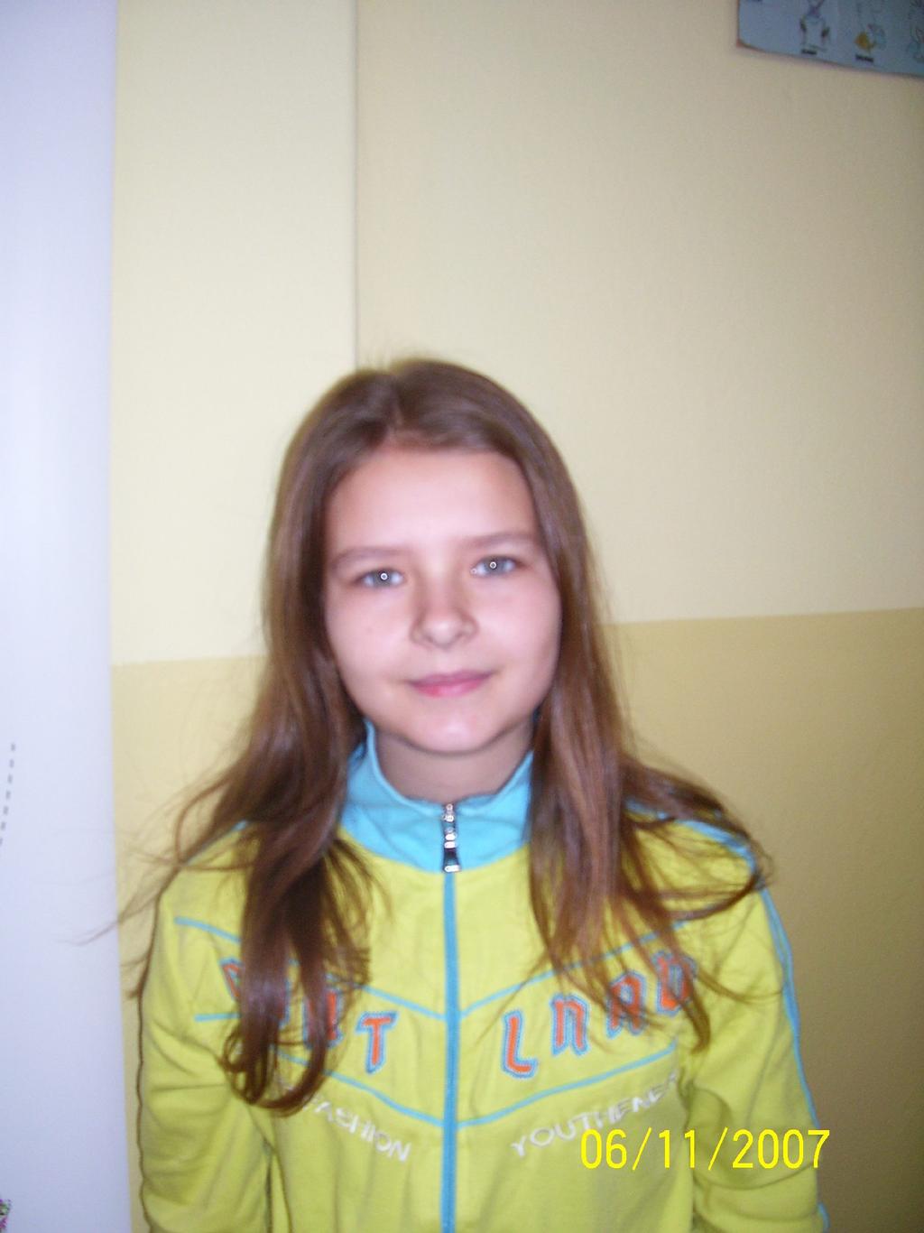 Hi! My name is Agnieszka, my surname is Bankiel. I am 12 years old. I am in class 6a. I like animals, playing football and swimming. I have got a dog.