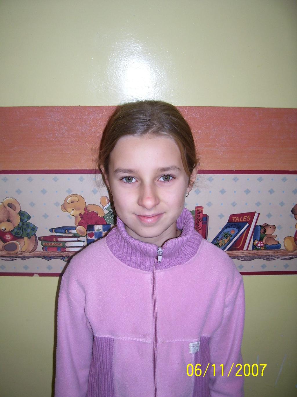 Hi! I'm Adriana Liszka I'm11 years old I am in class 5a. I have got a brother. His name is Maciek, he is 4. My favourite animals are horses and cats.