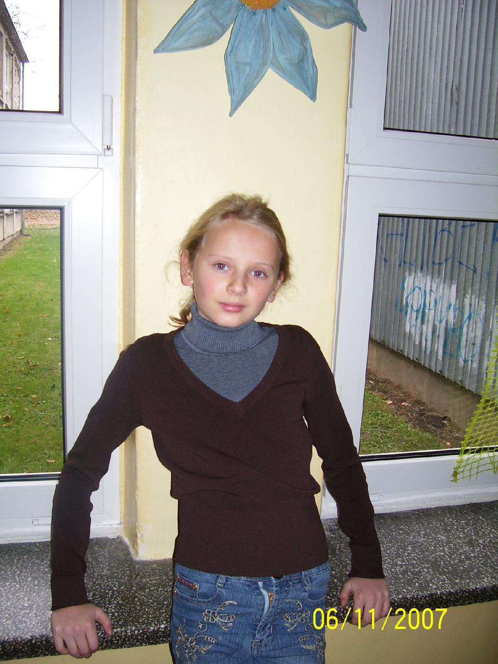 Hi! My name is Gosia. I m Polish. I m 11. I ve got one brother, he is 4. I love listening to music. My favorite singers are Rihanna and Fergie. I ve got their CDs.
