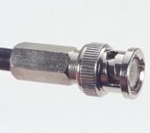 In this case the cable shield is clamped between the connector body and back nut.