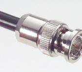 The connector center conductor is attached to the cable center conductor by crimp or solder.