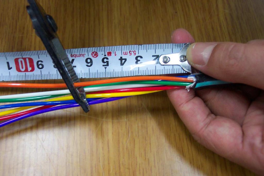 the grounding wire by using pliers. (Figure-10) Note. There is no need to do additional job for tension member grounding.