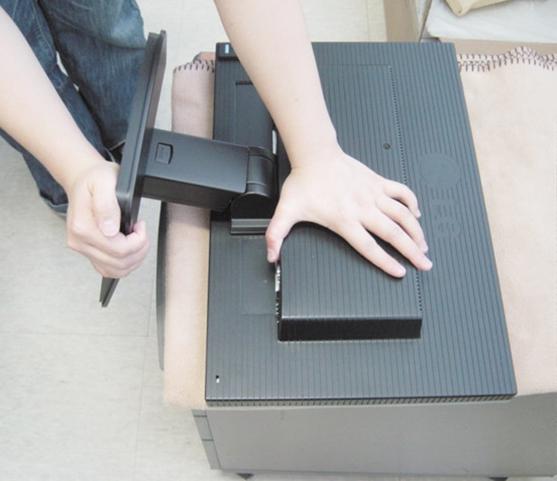 Connecting the Display To remove the Stand: 1. Put a cushion or soft cloth on a flat surface. 2.