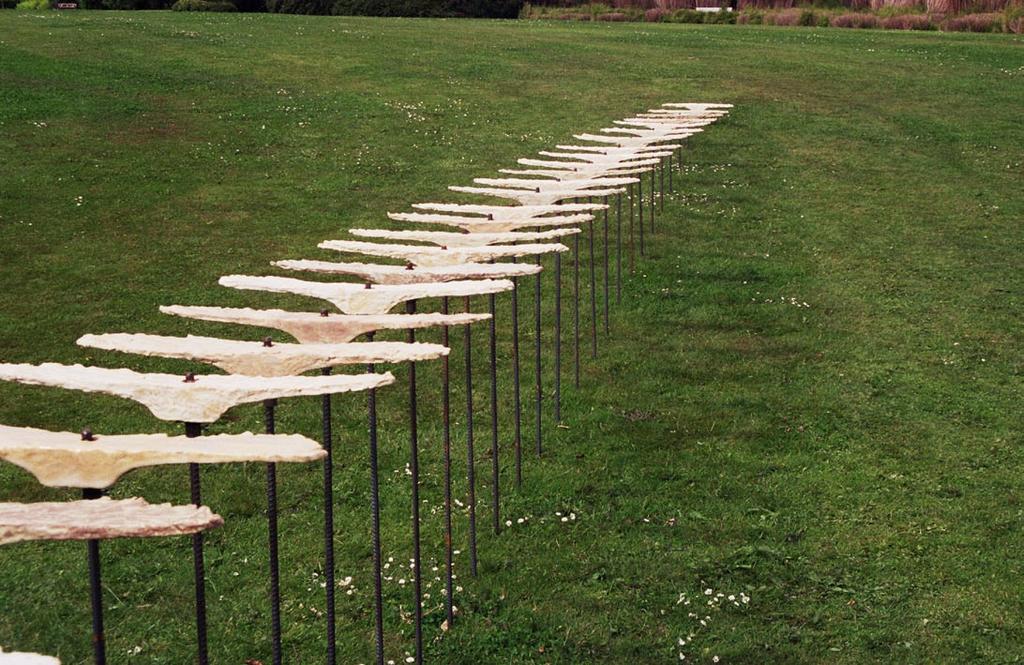The Line in the Lawn. 2000. Geographic Garden, Kolding, Denmark. Stoneware and steel. Group exhibition of environmental ceramics. 20 m/l x 15 to 100 cm/h. Photo by Helle Hove.