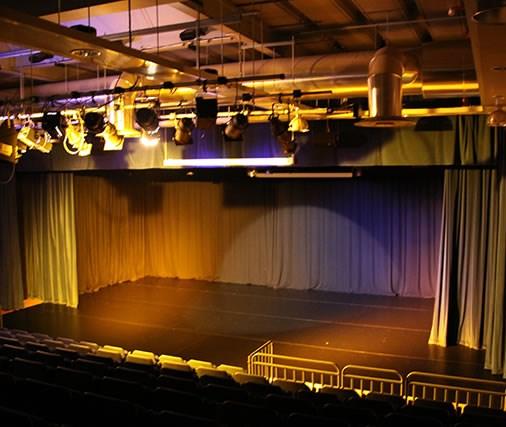 It is a traditional, proscenium arch space with a 12x8m matt black dance floor. The front of the staging area also houses an orchestra pit, available upon special request.