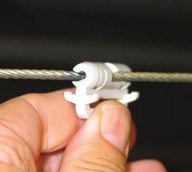 Twist and snap the Glider attachments of the DuctSox onto the cable (pliers may be helpful for